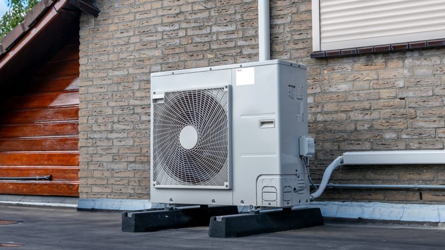 Waar plaats ik het buitendeel van mijn warmtepomp?